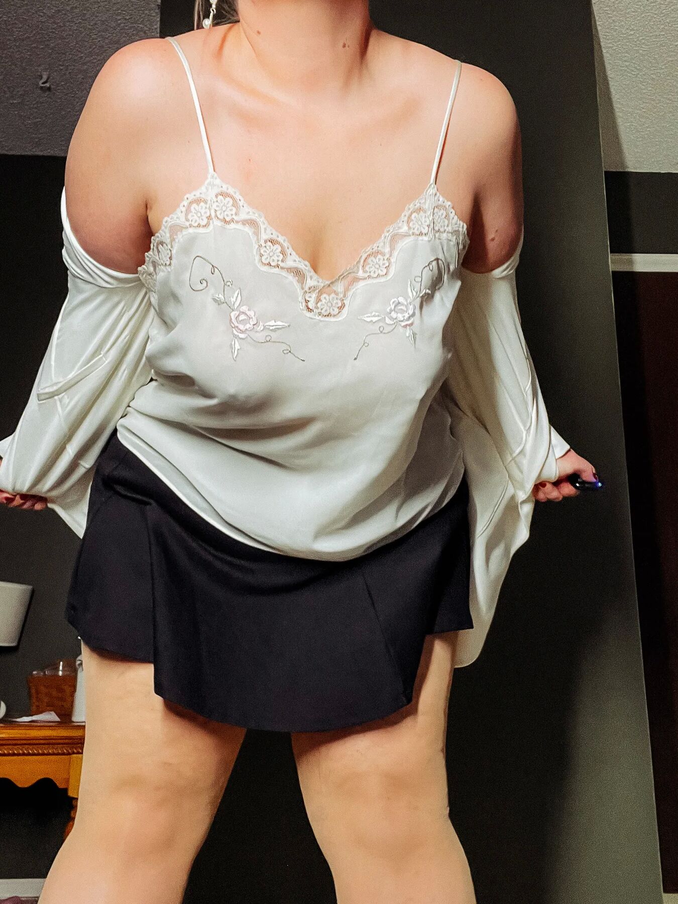 BBW in a mini black skirt and nylons with heels Big Thighs