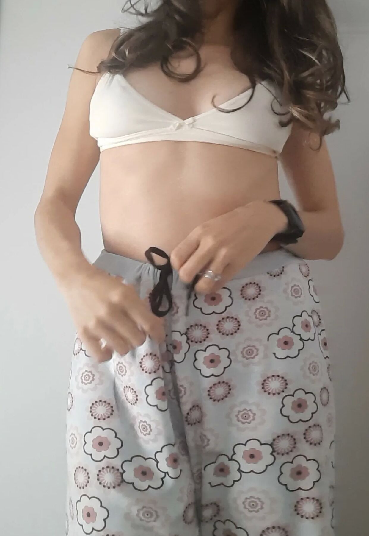 Teen takes off her pajamas