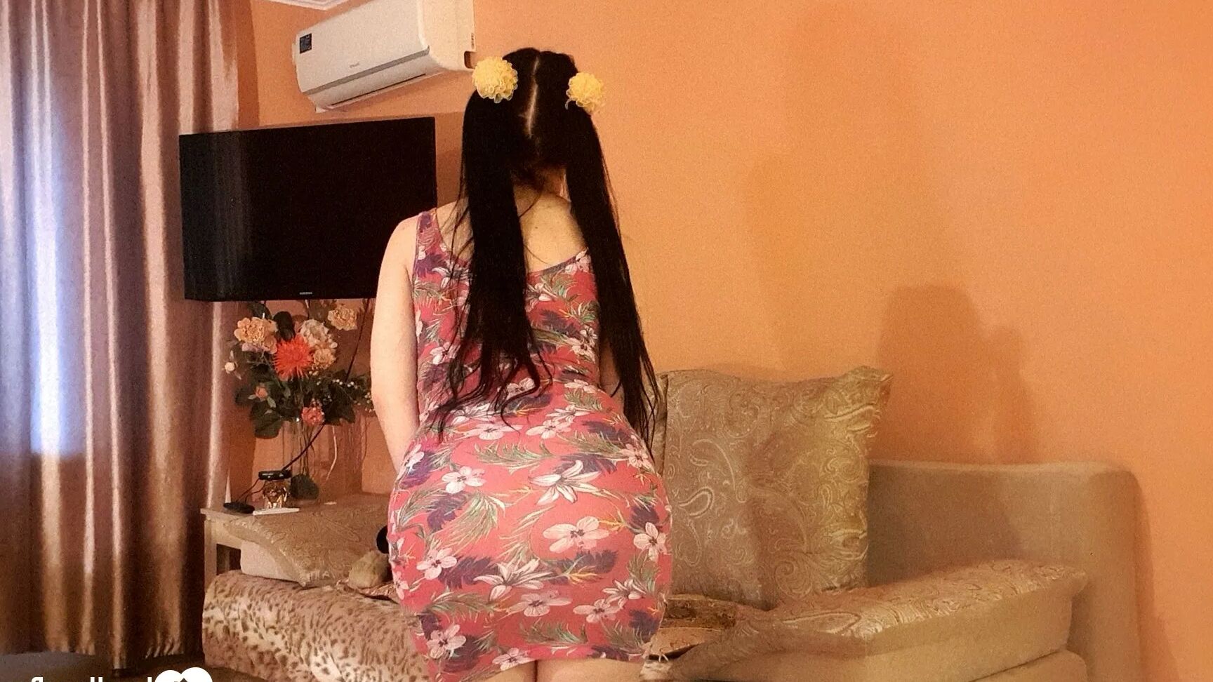 Brunette with pigtails poses in knee socks