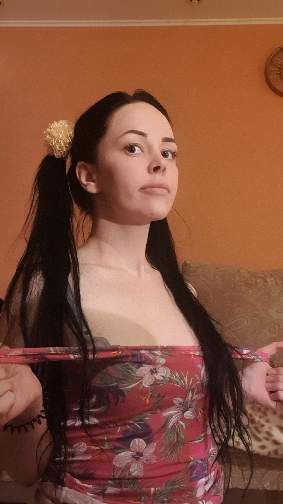 Brunette with pigtails poses in knee socks