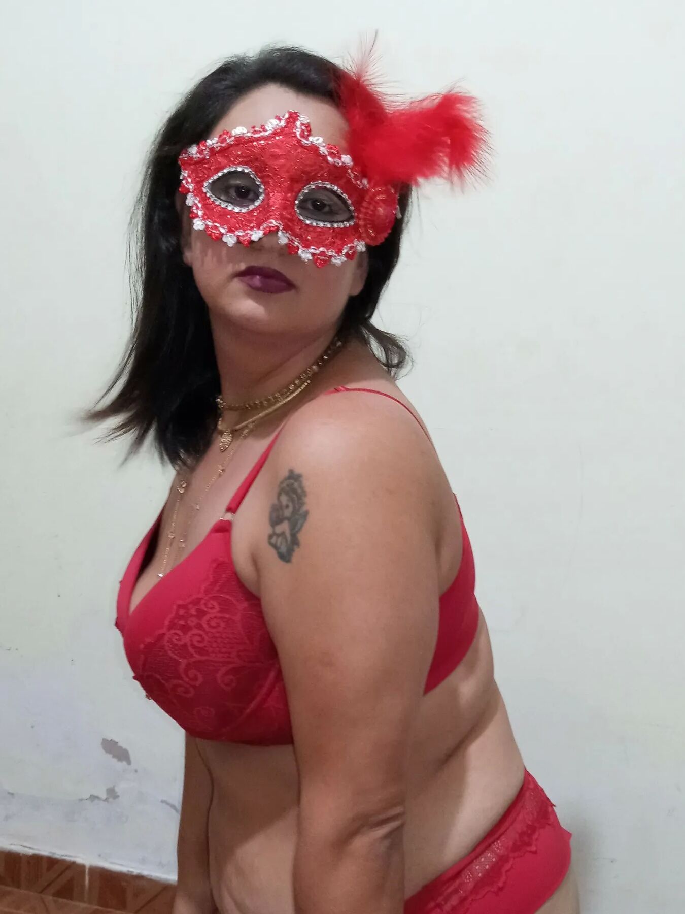 SHOWING OFF WEARING RED LINGERIE...