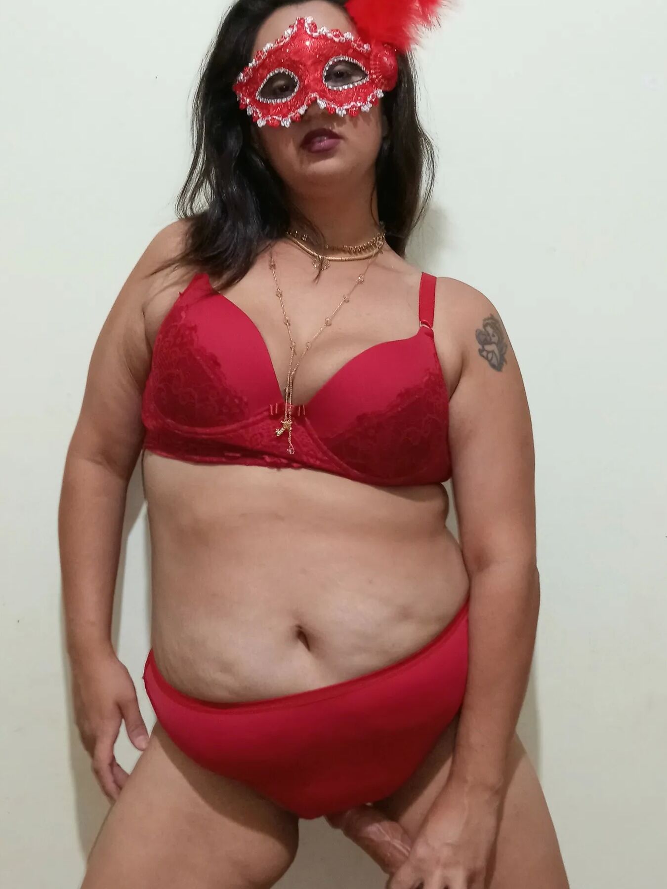 SHOWING OFF WEARING RED LINGERIE...