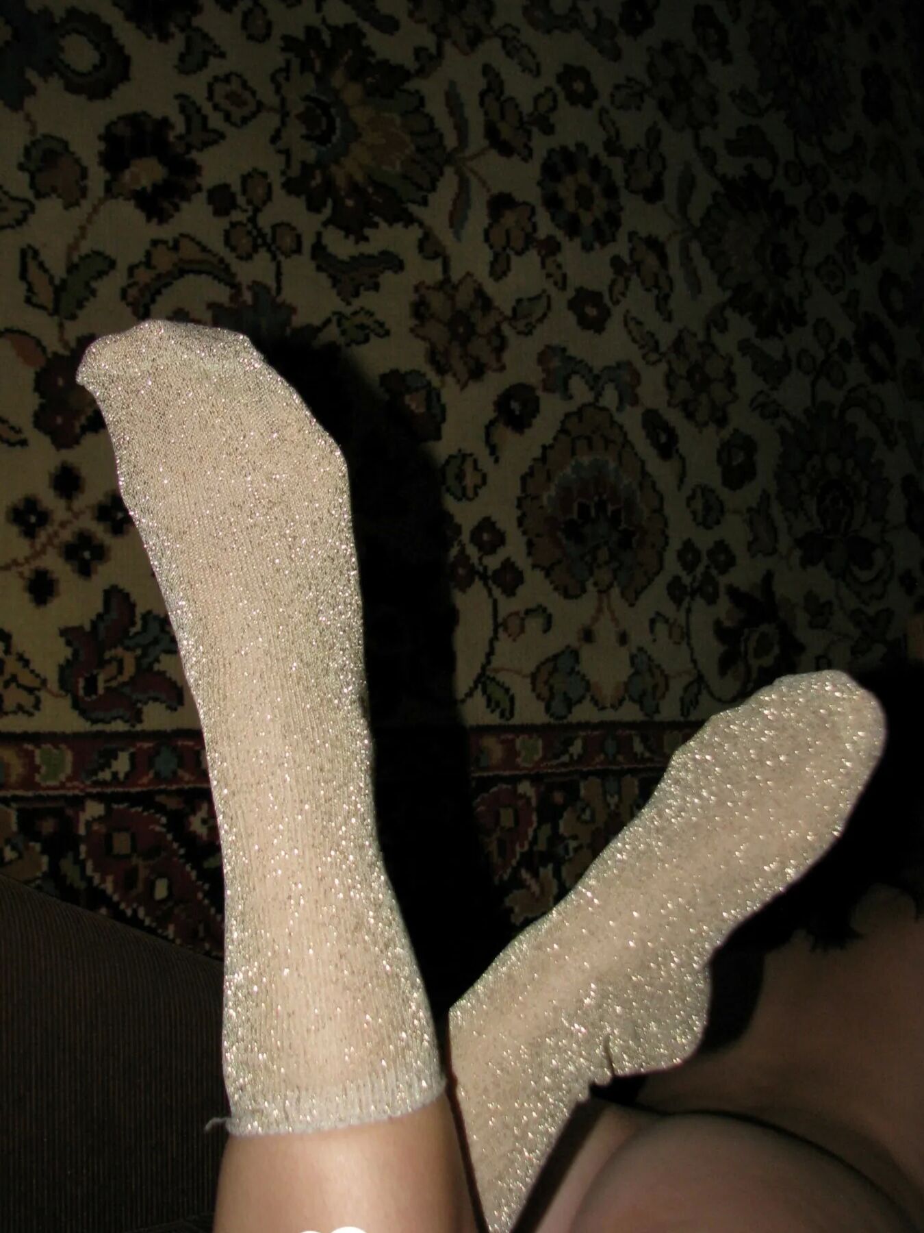 Nerdy babe keeps her sparkly socks on