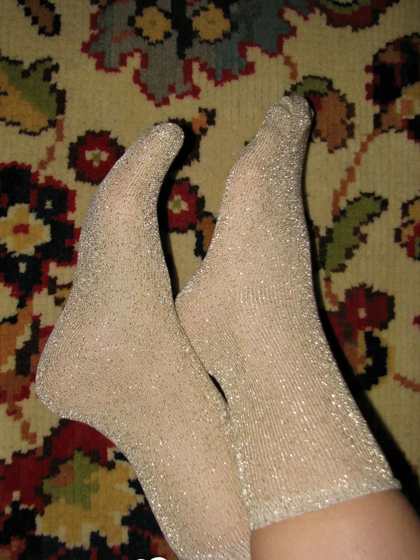 Nerdy babe keeps her sparkly socks on