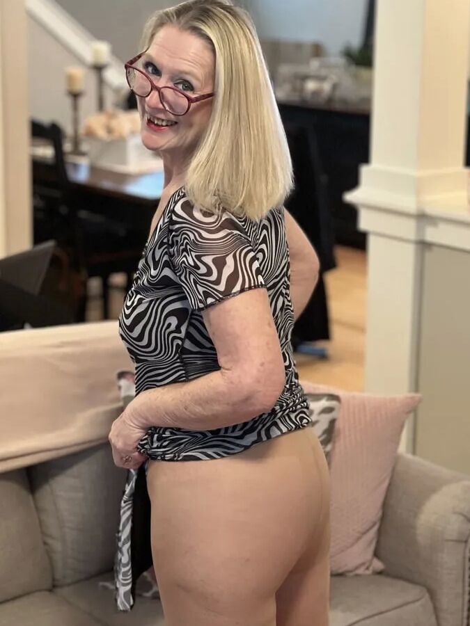66 YEAR OLD GILF STRIPS DOWN(Black and white dress)