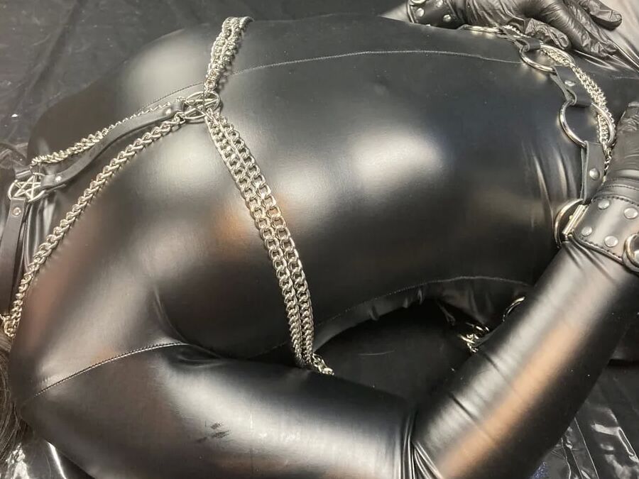 The mistress in her wetlook overall