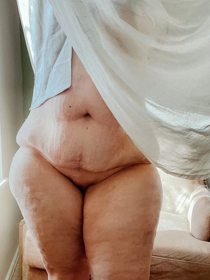 Silhouette in the curtain BBW Naked curves sensual chubby