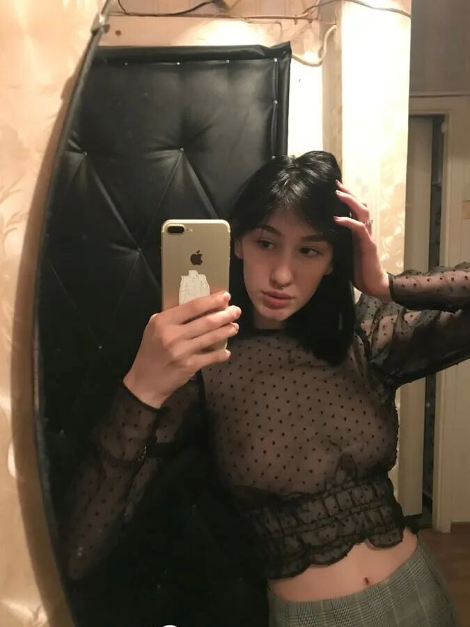 Busty beauty loves showing off her rack