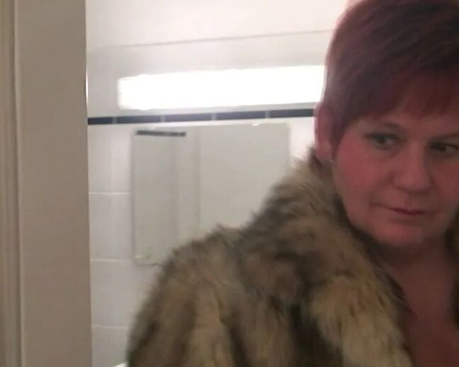 Secretly filmed in a fur coat