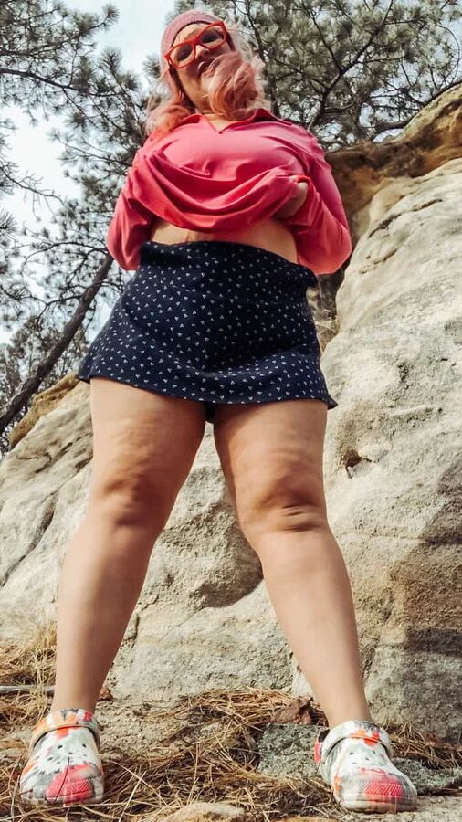 Outside bent over in dirty Pants down outdoors