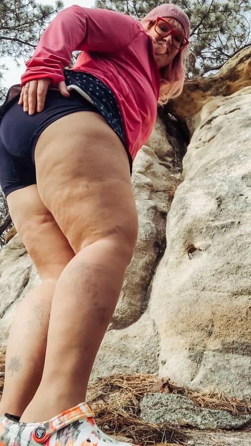 Outside bent over in dirty Pants down outdoors