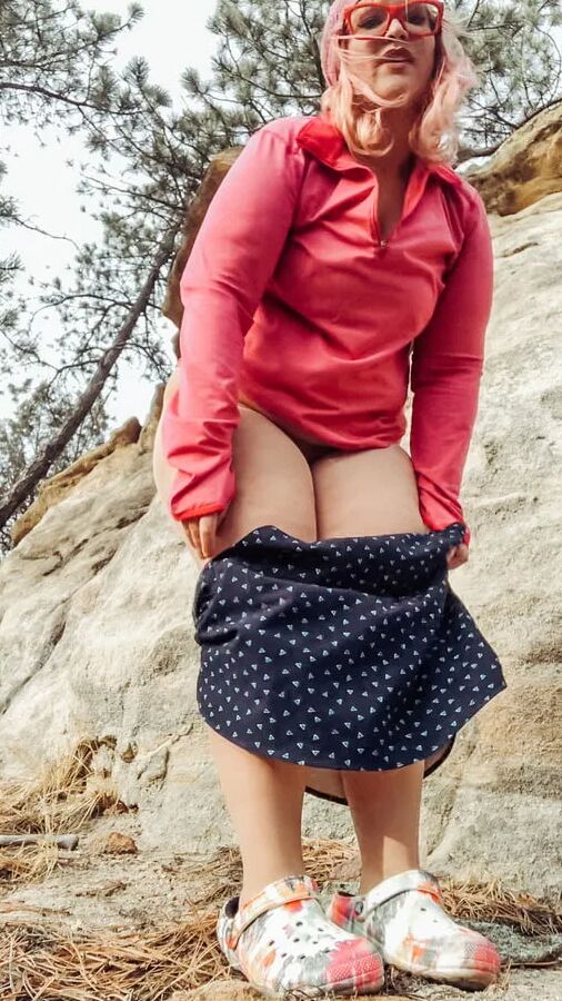 Outside bent over in dirty Pants down outdoors
