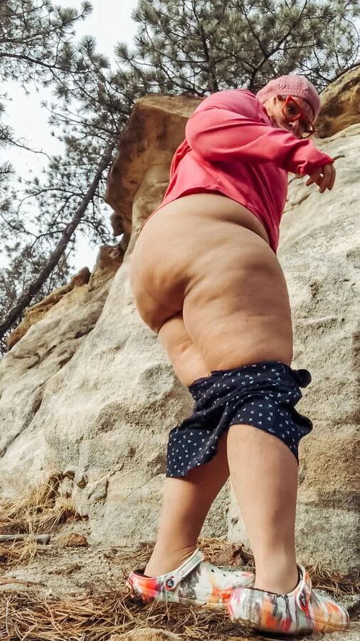 Outside bent over in dirty Pants down outdoors