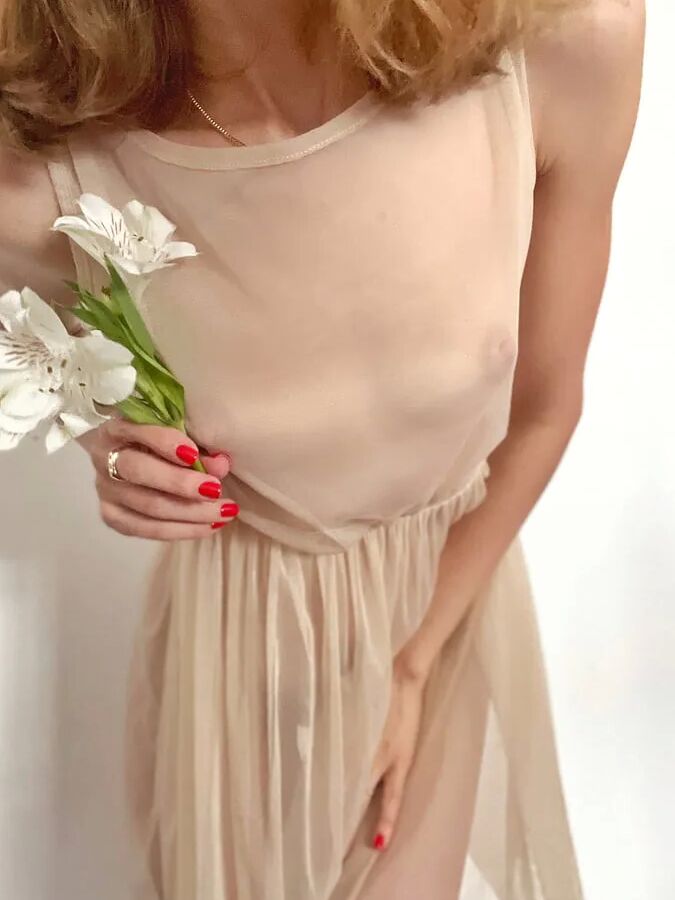 Pretty teen shows pussy under the dress