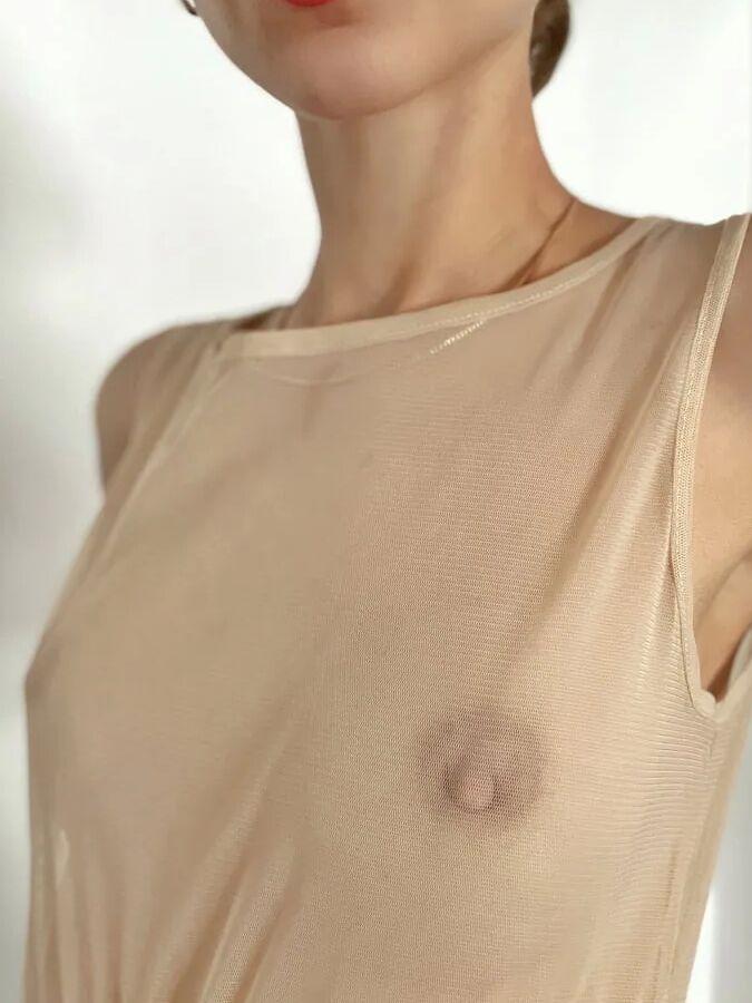 Pretty teen shows pussy under the dress