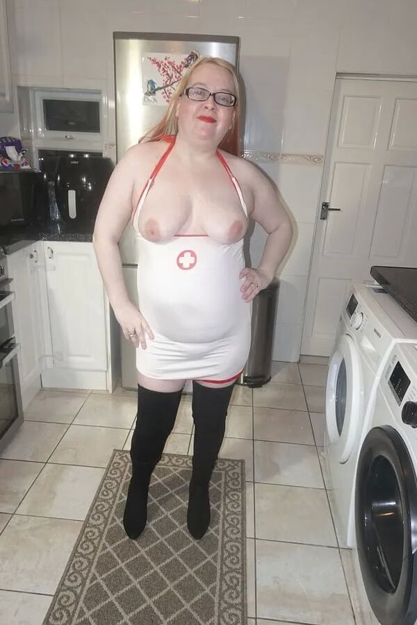 Naughty Nurse in Thigh Boots