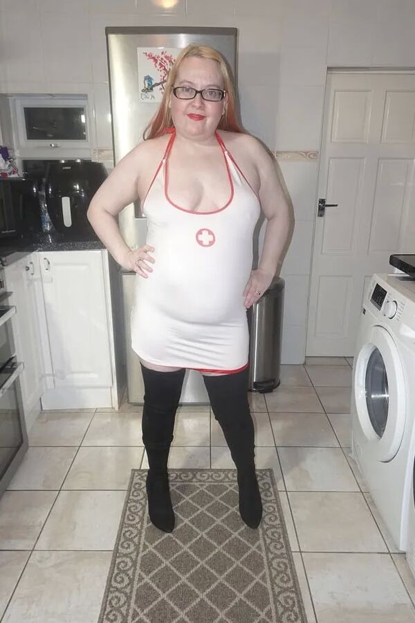 Naughty Nurse in Thigh Boots