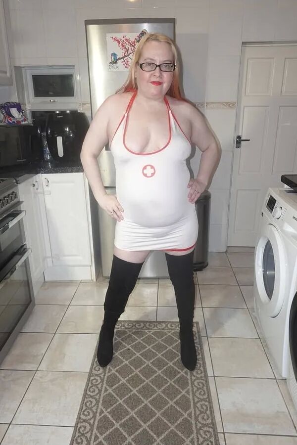 Naughty Nurse in Thigh Boots