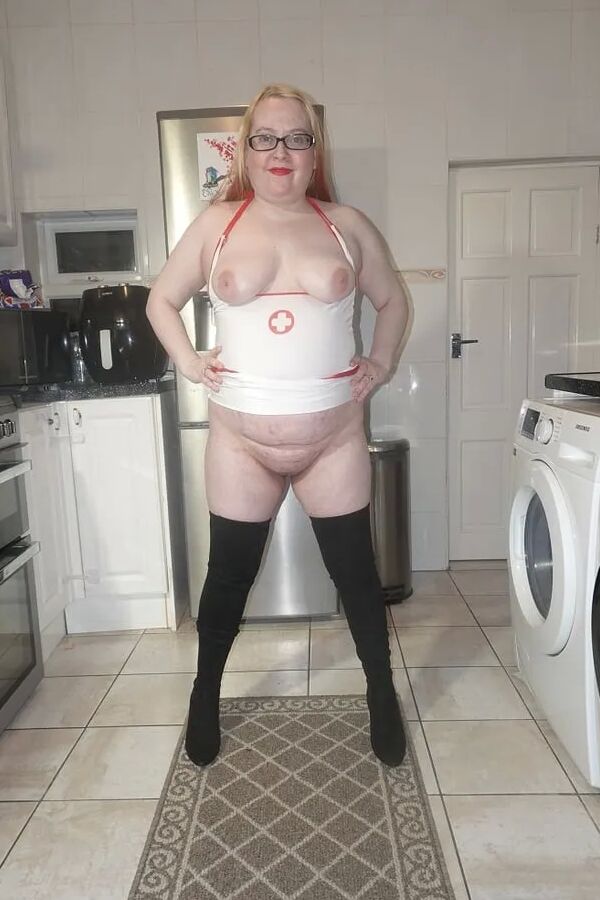 Naughty Nurse in Thigh Boots