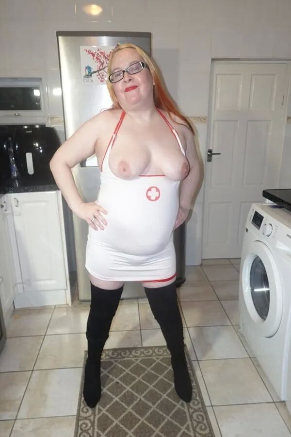 Naughty Nurse in Thigh Boots