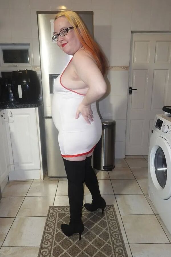 Naughty Nurse in Thigh Boots