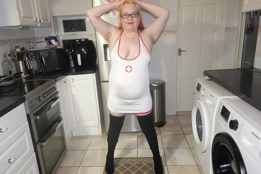 Naughty Nurse in Thigh Boots