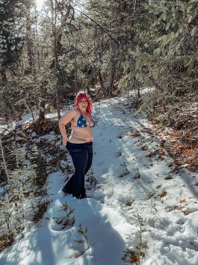 Deeper in the woods Naked and bent over in the snow