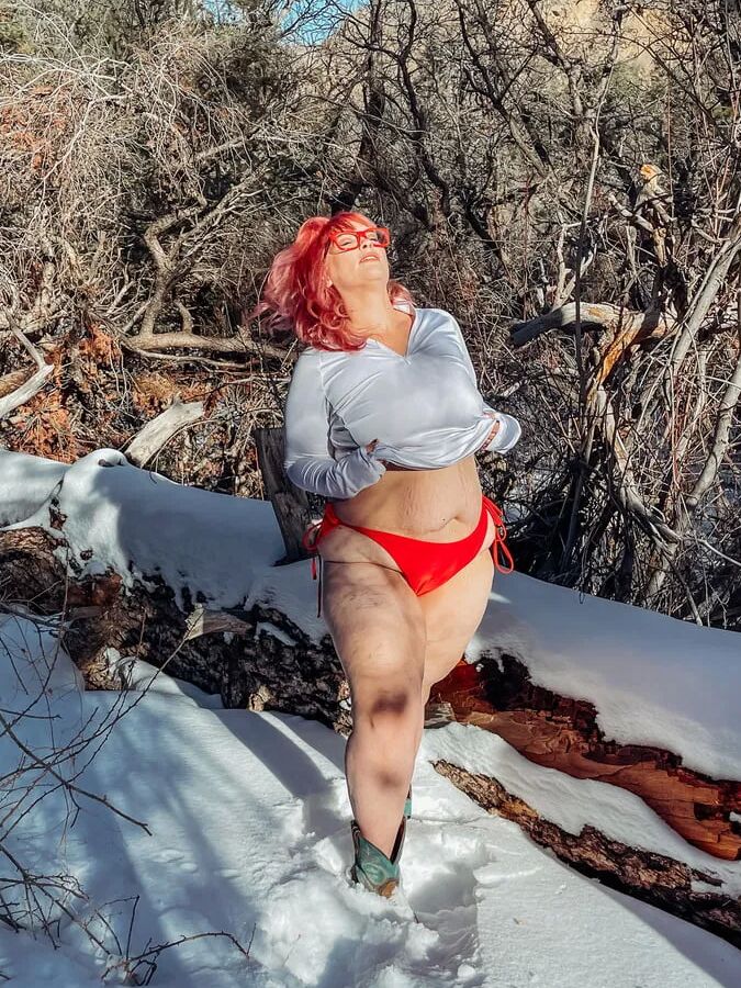 Deeper in the woods Naked and bent over in the snow