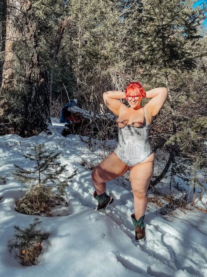 Deeper in the woods Naked and bent over in the snow