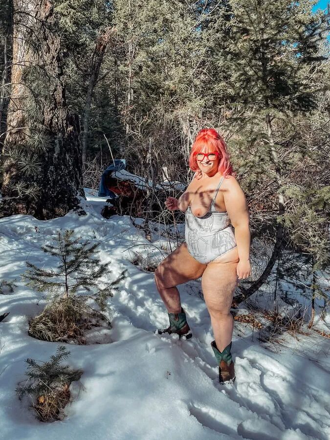 Deeper in the woods Naked and bent over in the snow