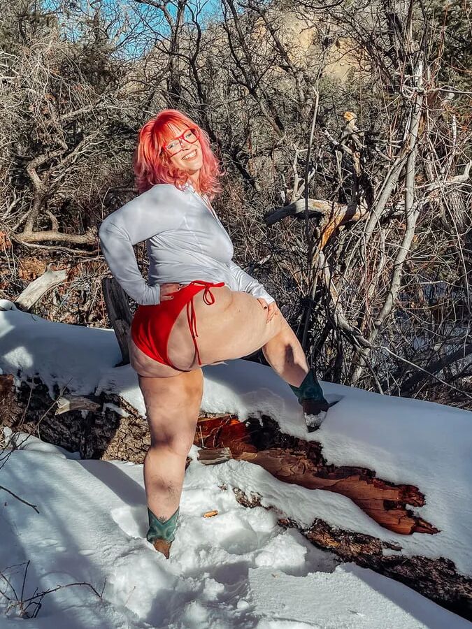 Deeper in the woods Naked and bent over in the snow