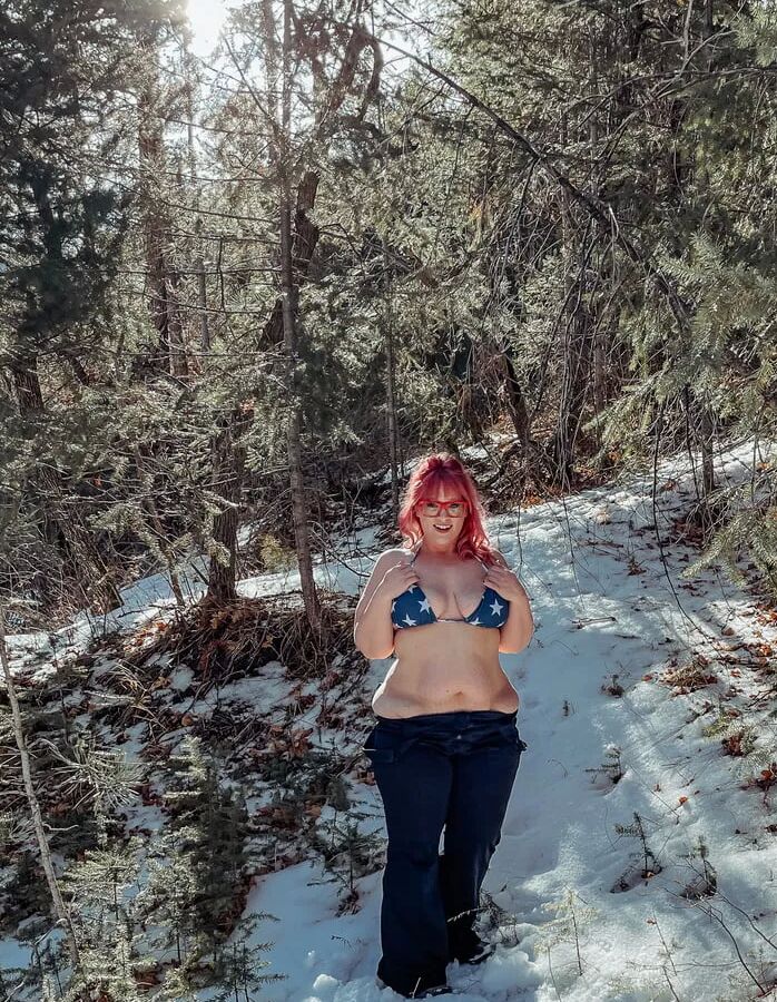 Deeper in the woods Naked and bent over in the snow