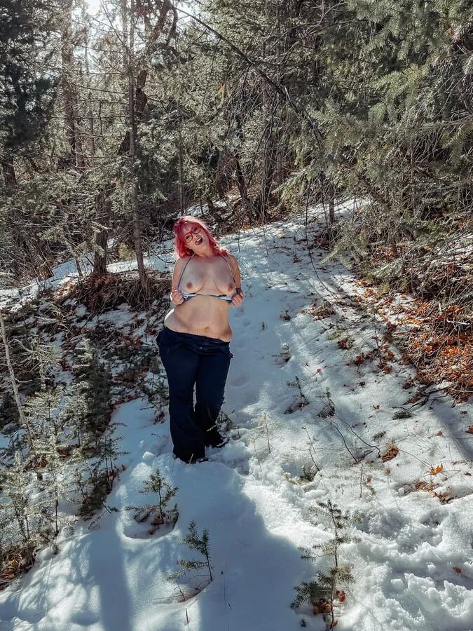 Deeper in the woods Naked and bent over in the snow