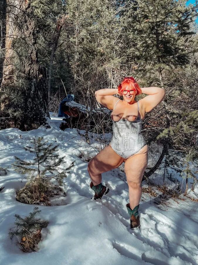 Deeper in the woods Naked and bent over in the snow