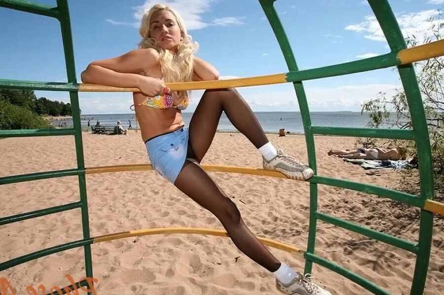 Blonde At The Beach In Jean Skirt, Black Pantyhose