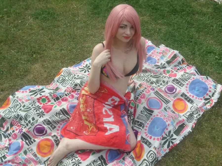 Pink-haired beauty plays with her love tunnel