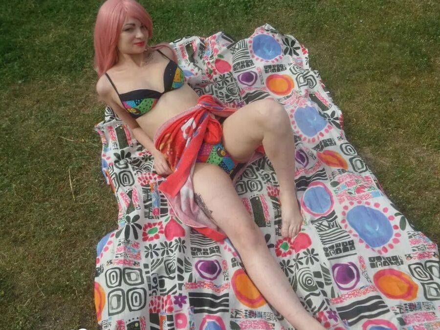 Pink-haired beauty plays with her love tunnel