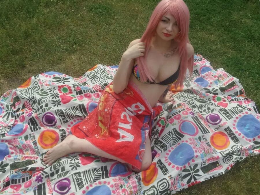 Pink-haired beauty plays with her love tunnel
