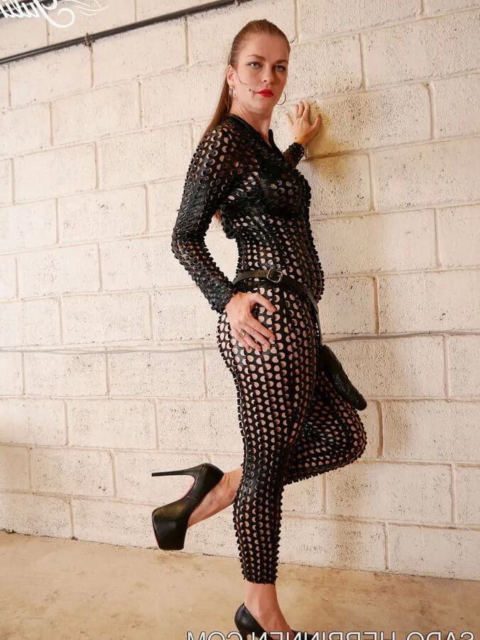 Spandex Catsuit, Strapon and High Heels