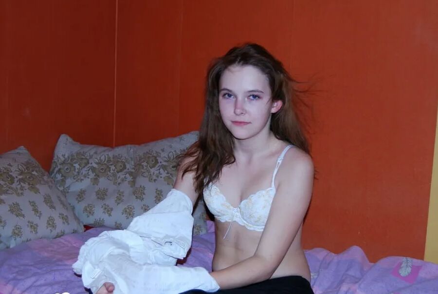 Schoolgirl showing off her stunning naked body