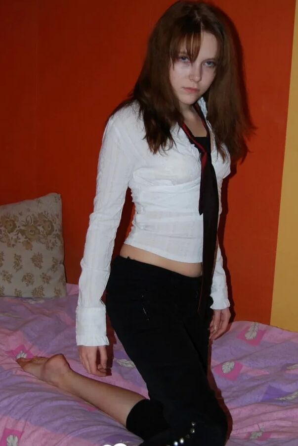 Schoolgirl showing off her stunning naked body
