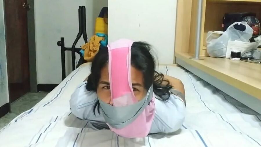 Panty Hooded Girl Gagged With Socks And Tape