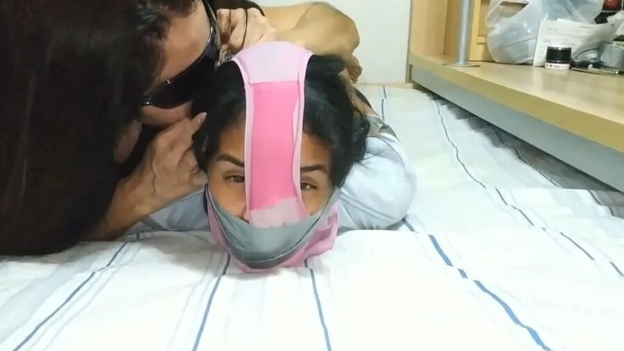 Panty Hooded Girl Gagged With Socks And Tape