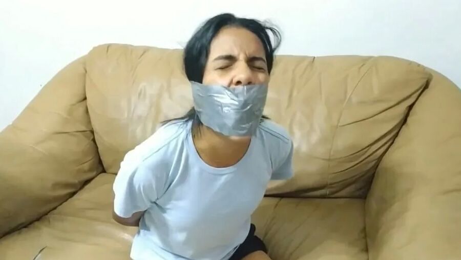 Panty Hooded Girl Gagged With Socks And Tape