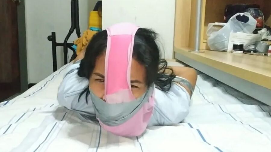 Panty Hooded Girl Gagged With Socks And Tape