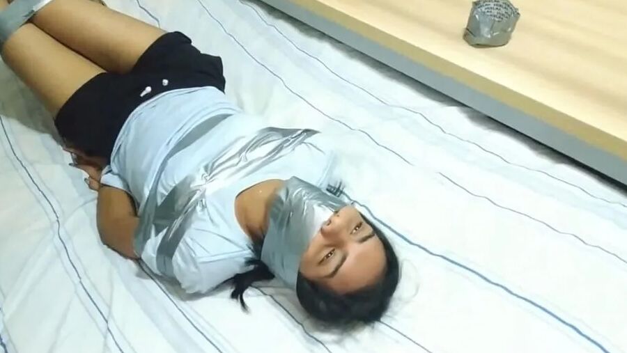 Panty Hooded Girl Gagged With Socks And Tape