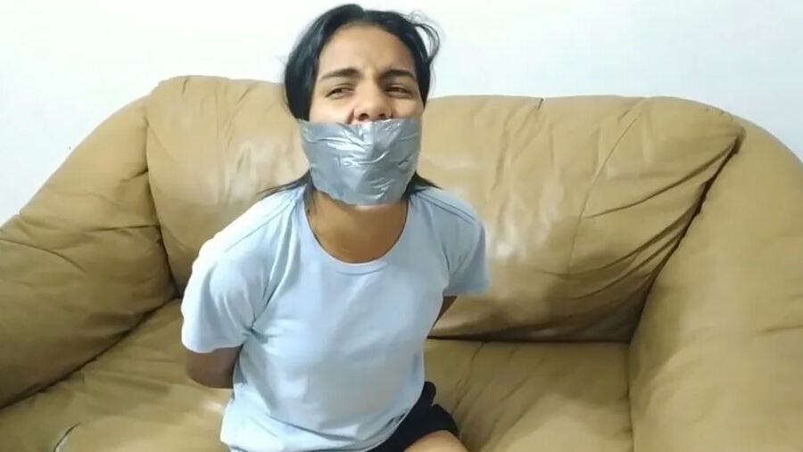 Panty Hooded Girl Gagged With Socks And Tape