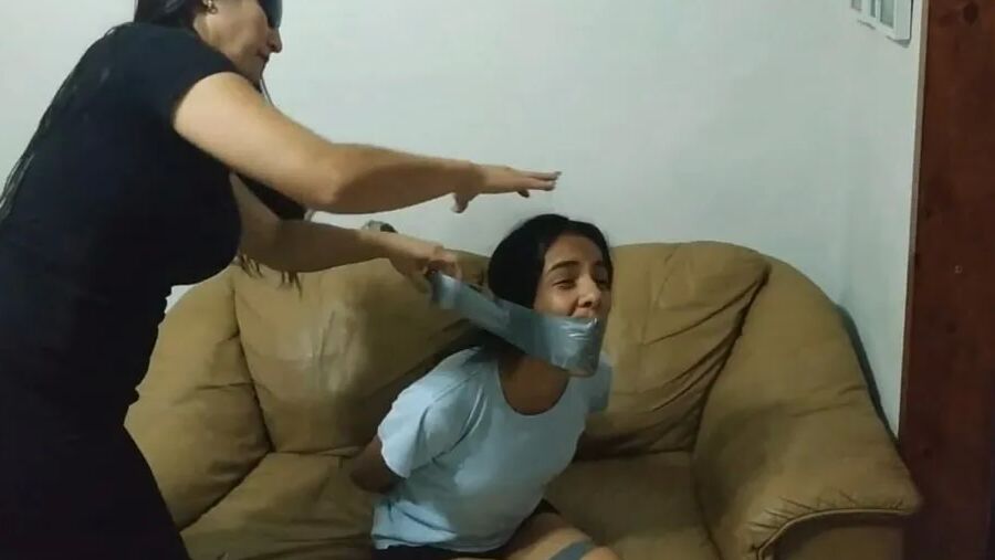 Panty Hooded Girl Gagged With Socks And Tape