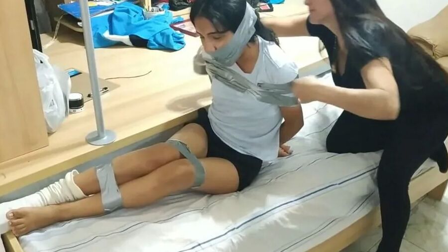 Panty Hooded Girl Gagged With Socks And Tape