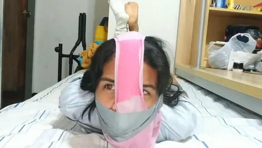 Panty Hooded Girl Gagged With Socks And Tape